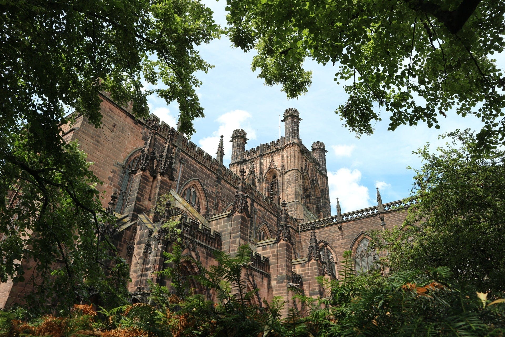 peeking-out-at-chester-cathedral-through-trees-greenery