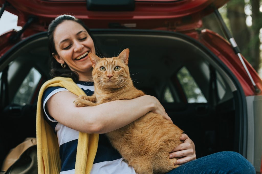 ginger coat with their owner